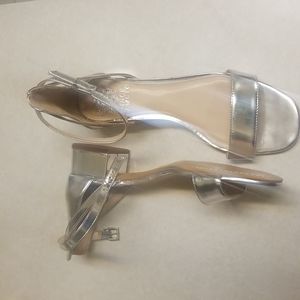 Vince Camuto silver metallic sandals.